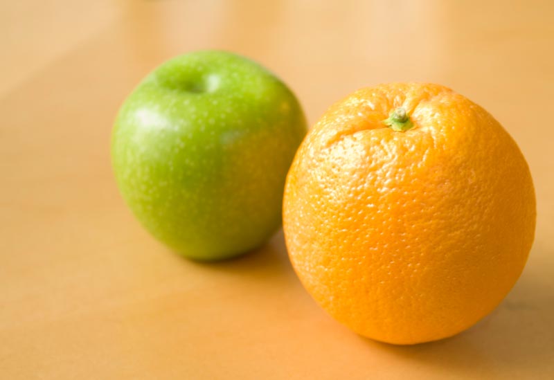 A photo of an apple and an orange