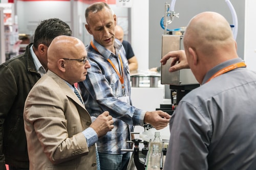 A photo of trade show participants depicting Authoritative Trade Show Tips for Exhibitors