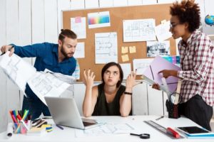 A team argues and depicts Handling Difficult People at Work