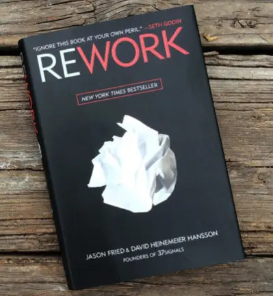 a photo of the book cover of Rework by Jason Fried and David Heinemeir Hansson