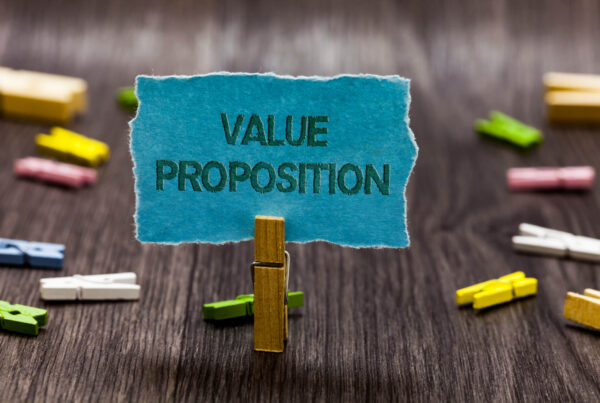 A clothes pin holds up a sign that says Value Proposition