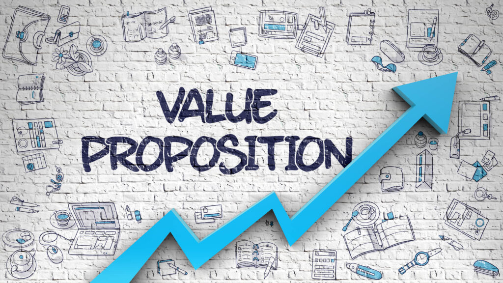 The words value proposition are written on a brick wall that contains an upward sloping graph