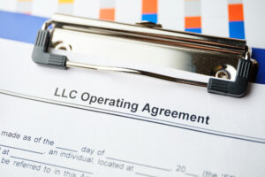 Legal document LLC Operating Agreement on paper.