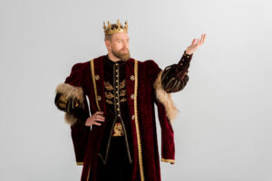A uniformed king depicts a narcissist at work.