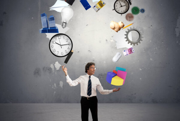 A business owner juggles many duties by using a small business management tool.