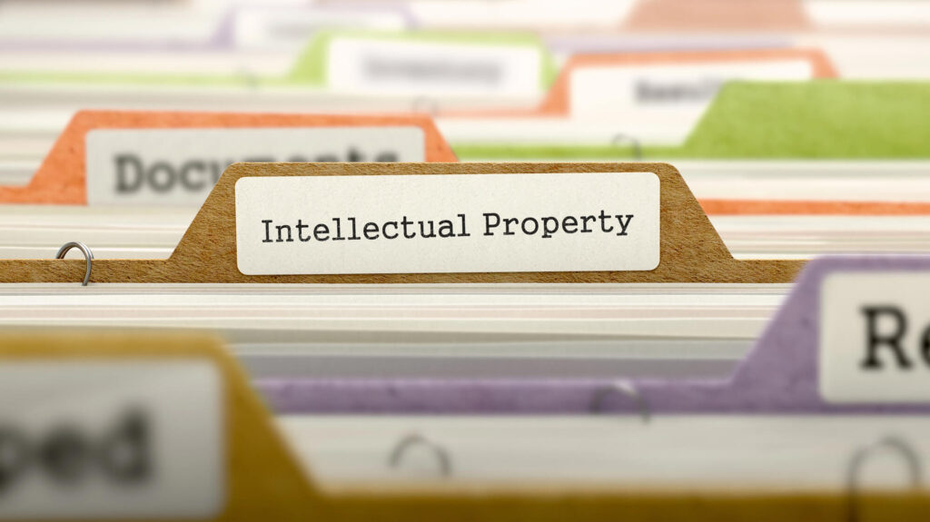 A photo of a file folder with a tab that reads Intellectual Property.