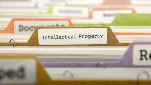A photo of a file folder with a tab that reads Intellectual Property.