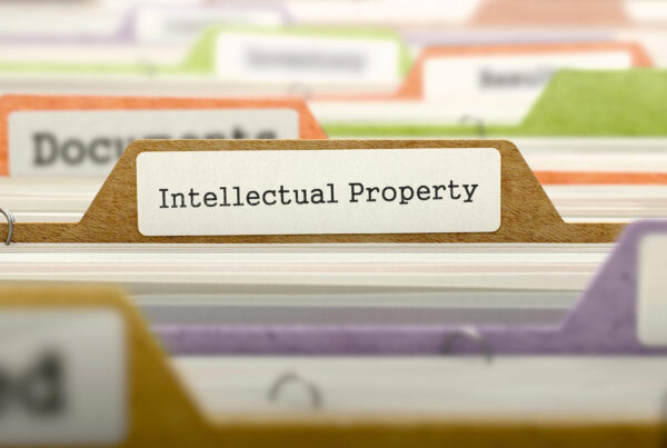 A photo of a file folder with a tab that reads Intellectual Property.
