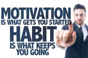 A slide says Motivation is what gets you started. Habit is what keeps you going.