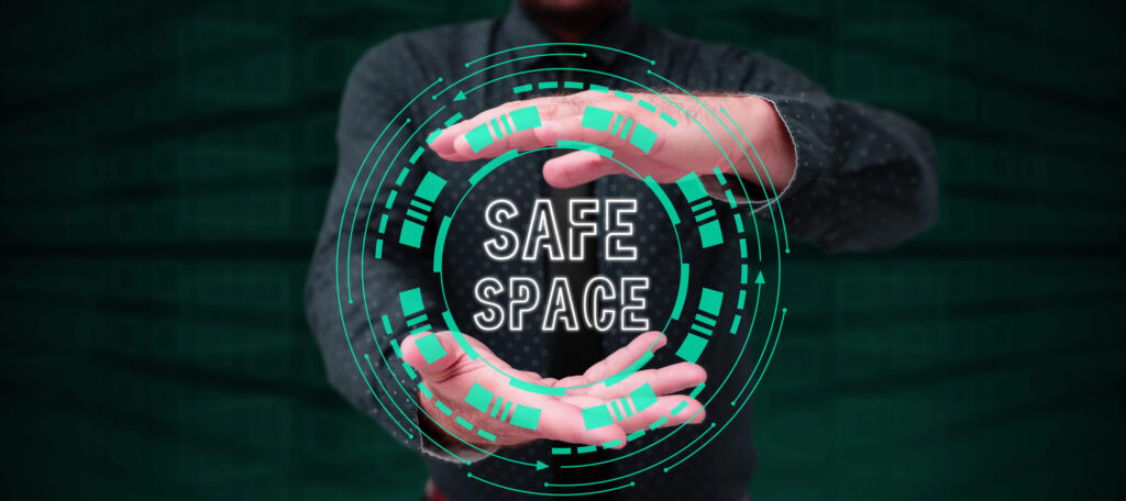 A graphic of a man's hands holding a circle that says safe place
