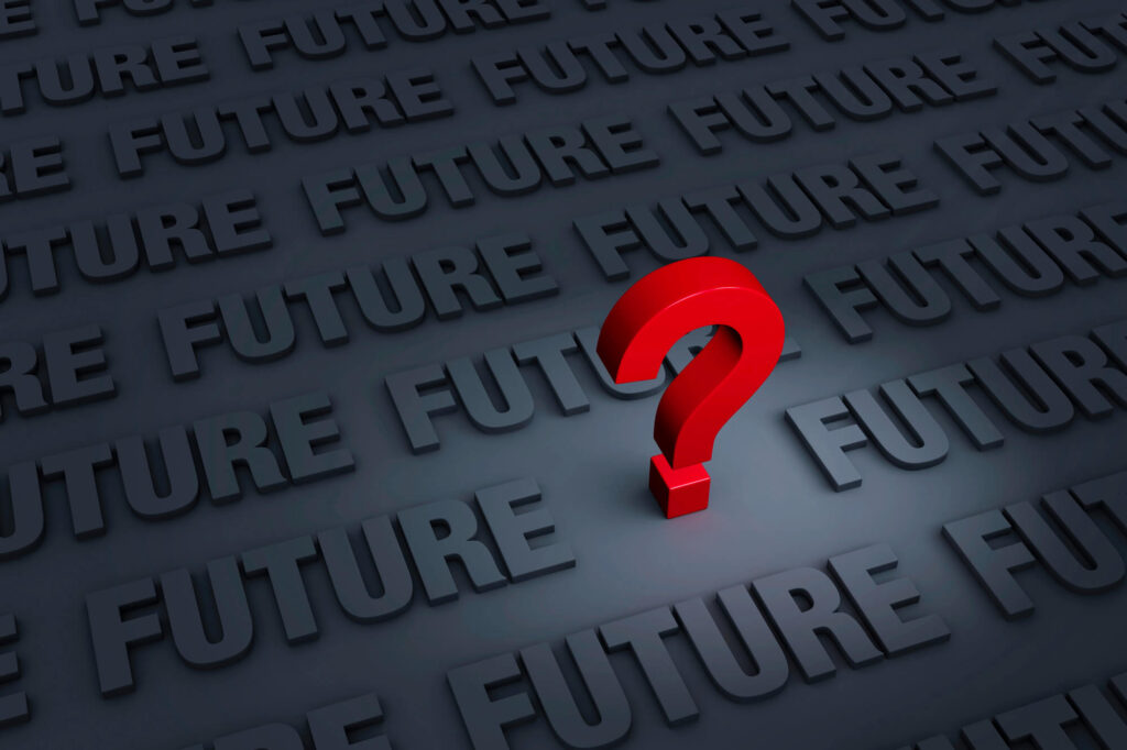 A dark grey graphic of a tabletop array of the word "future" with a red question mark in the middle.