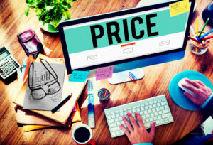 A graphic that shows a messy desk with a monitor that says "price".