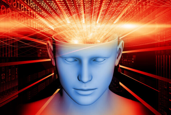 A graphic that shows the open skull of a mannequin with light beams shining out