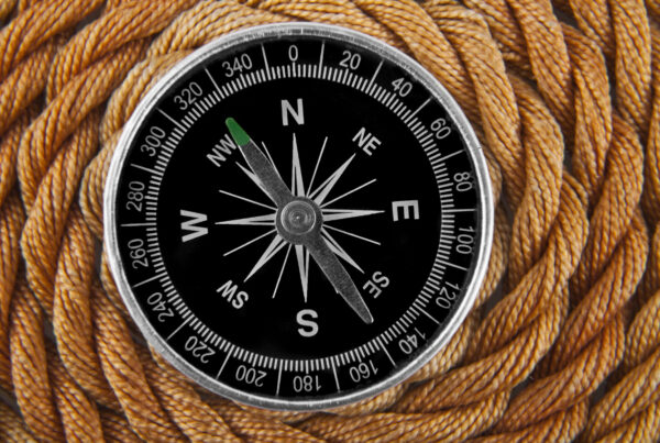 A photo of a navigational compass that symbolizes the need for a business roadmap