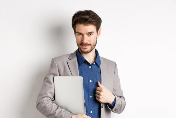 A photo of a professional looking salesperson that appears to be introverted